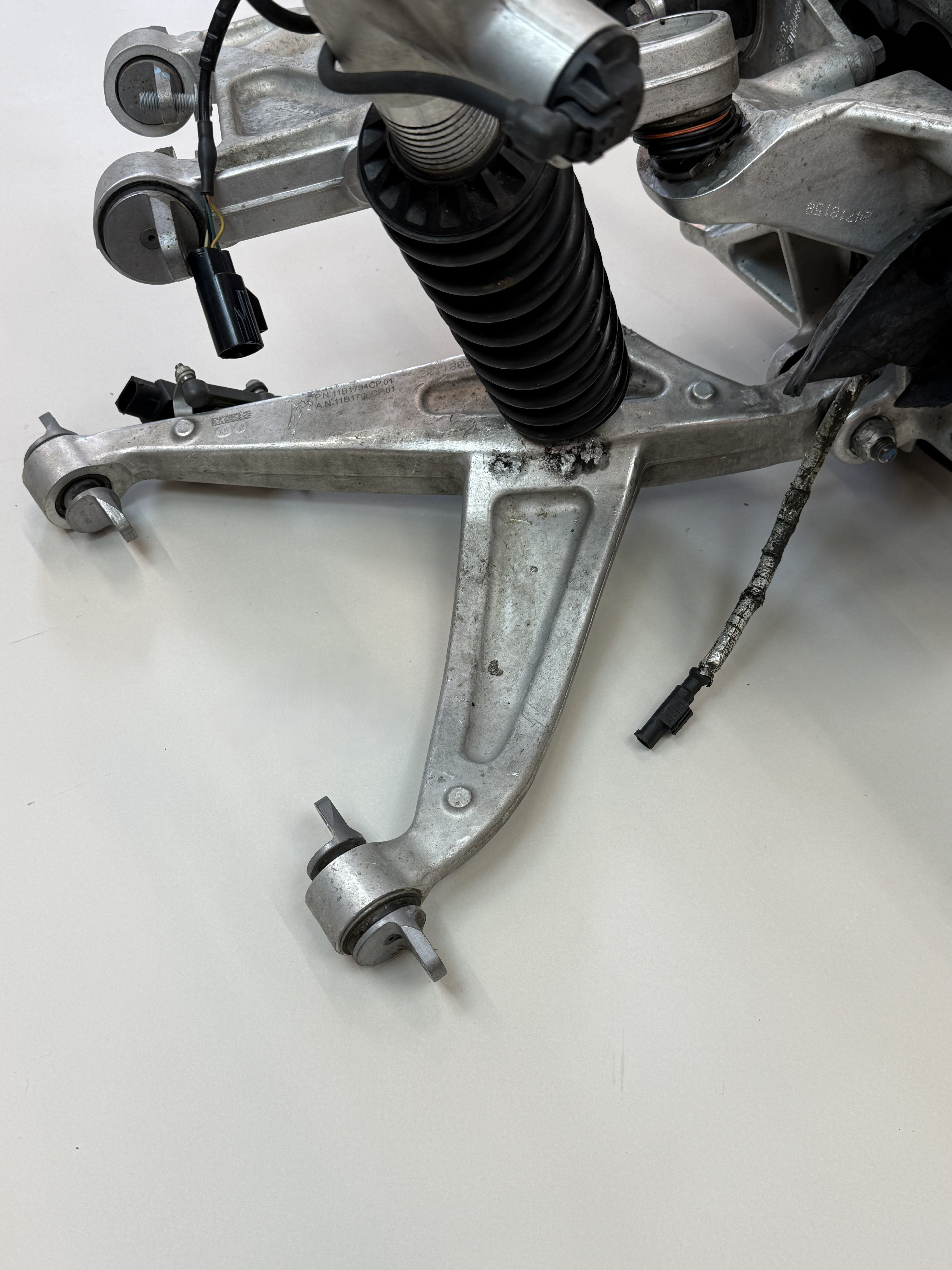 McLaren 570S Rear Left Suspension & Brake Assembly OEM | Carbon Ceramic Rotor Red Caliper Shock
