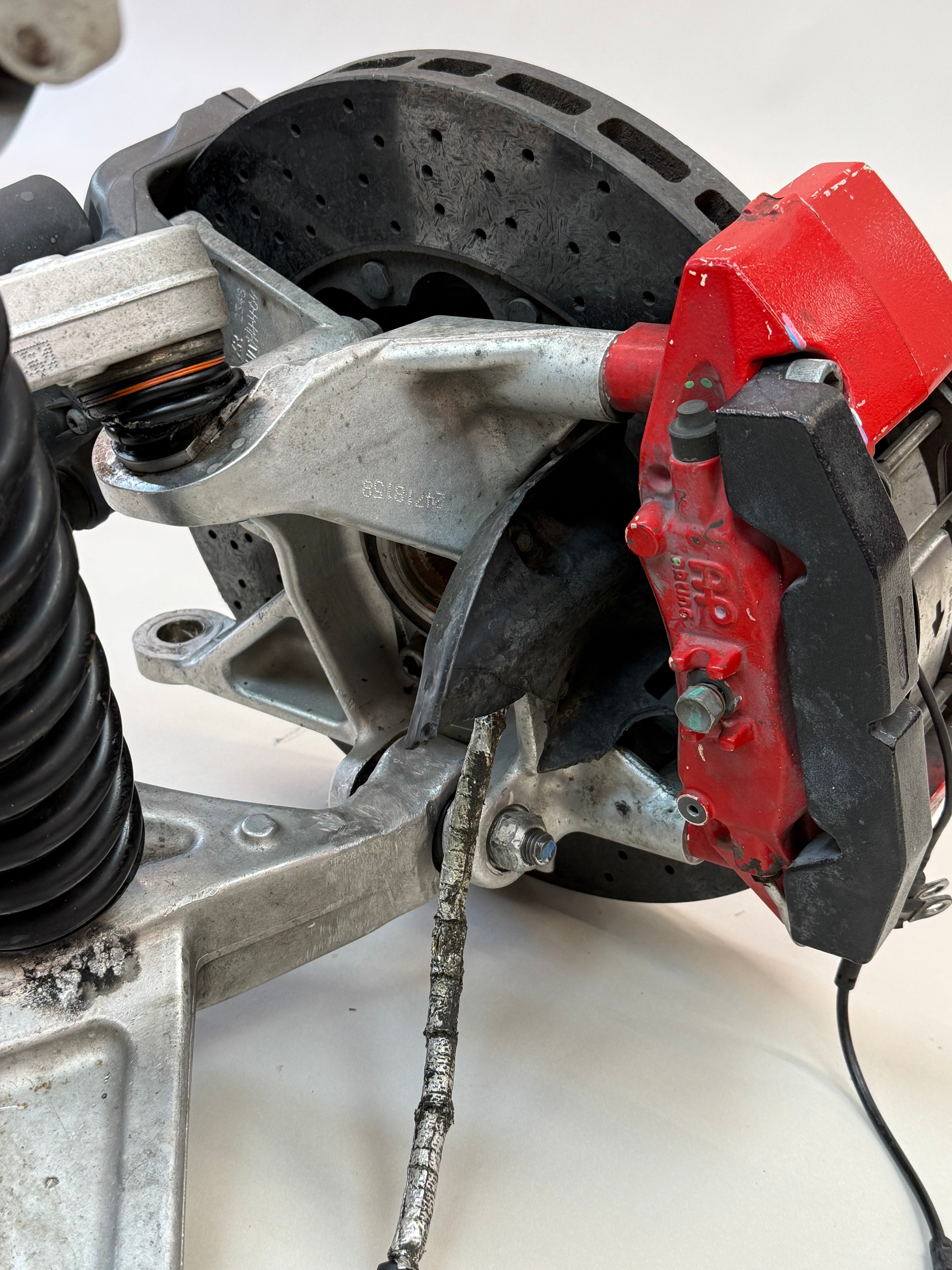 McLaren 570S Rear Left Suspension & Brake Assembly OEM | Carbon Ceramic Rotor Red Caliper Shock