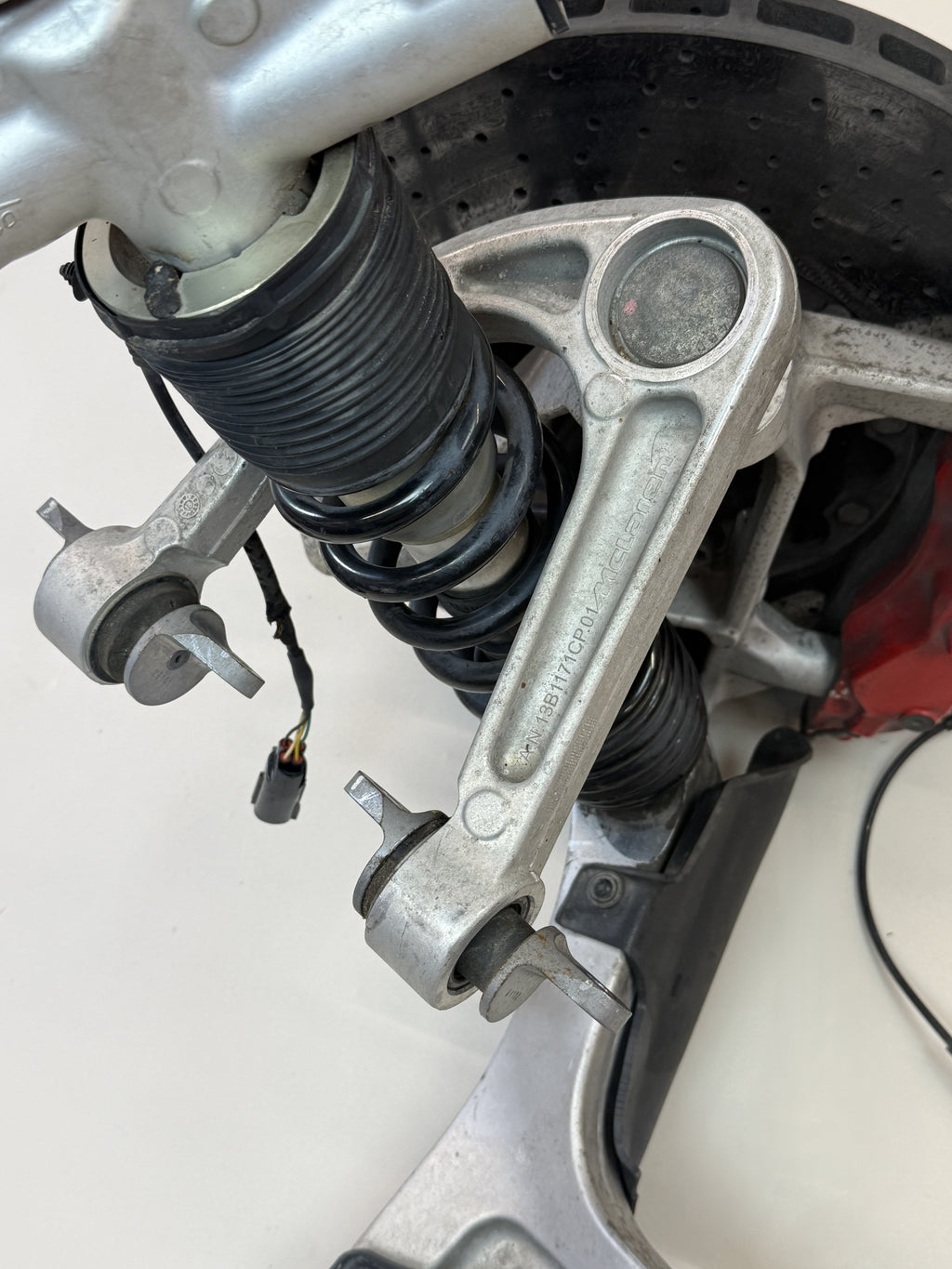 McLaren 570S Front Right Suspension & Brake Assembly OEM | Carbon Ceramic Rotor Red Caliper Shock