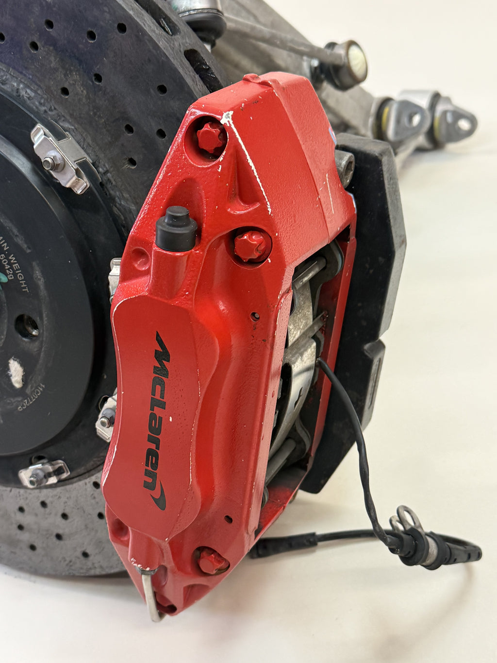 McLaren 570S Rear Right Suspension & Brake Assembly OEM | Carbon Ceramic Rotor Red Caliper Shock