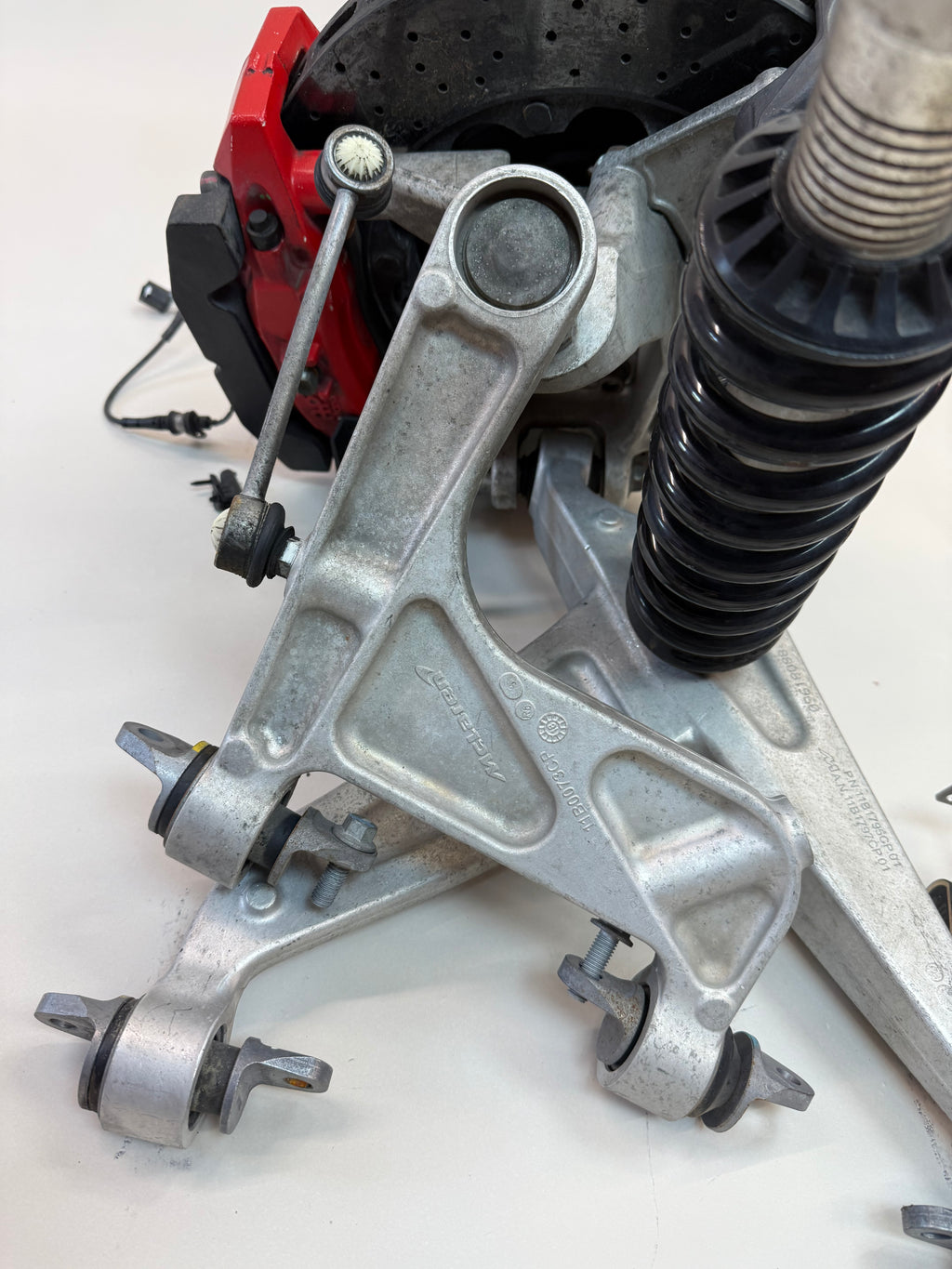 McLaren 570S Rear Right Suspension & Brake Assembly OEM | Carbon Ceramic Rotor Red Caliper Shock