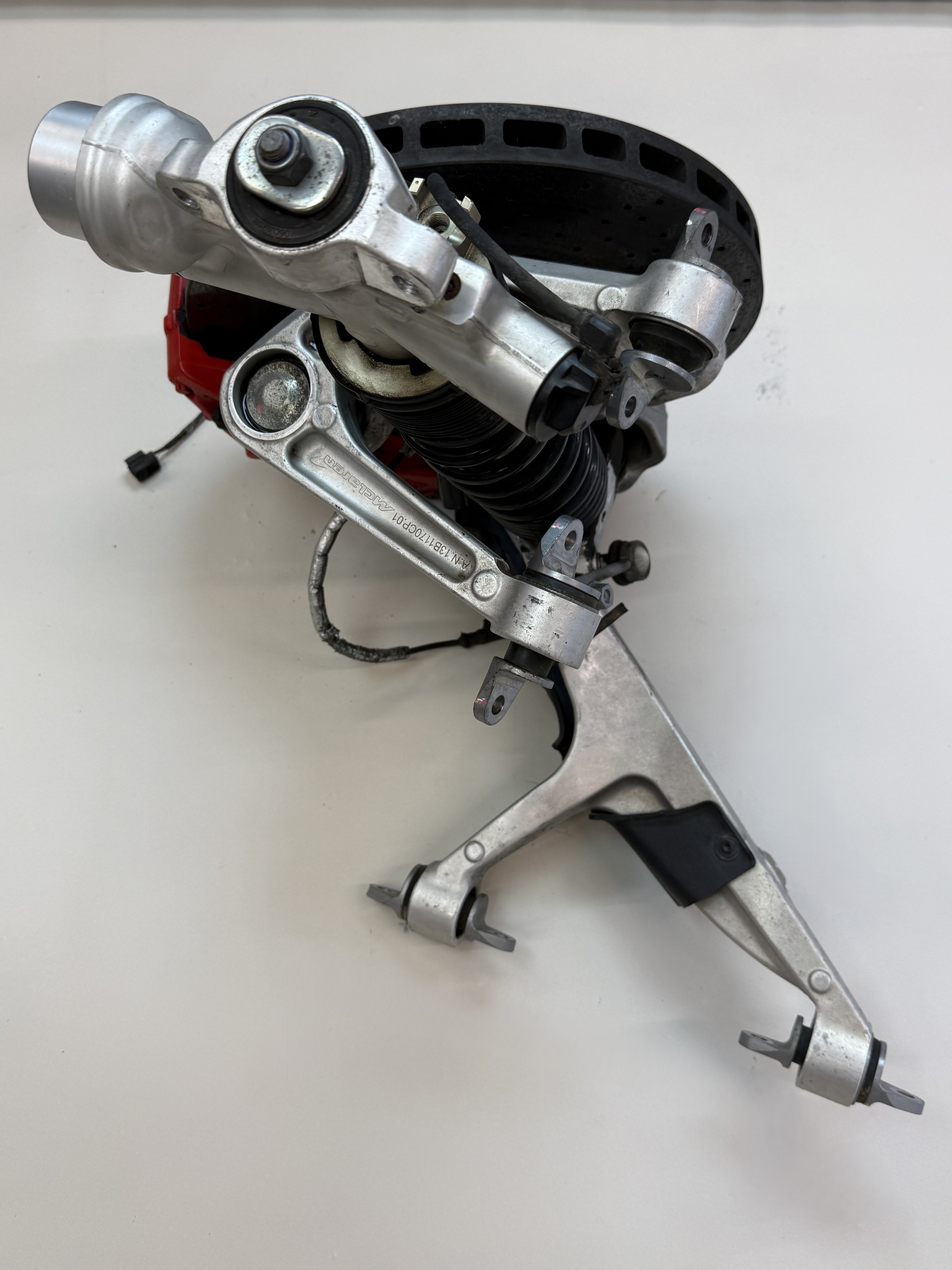 McLaren 570S Front Left Side Suspension & Brake Assembly OEM | Carbon Ceramic Rotor Red Caliper Shock