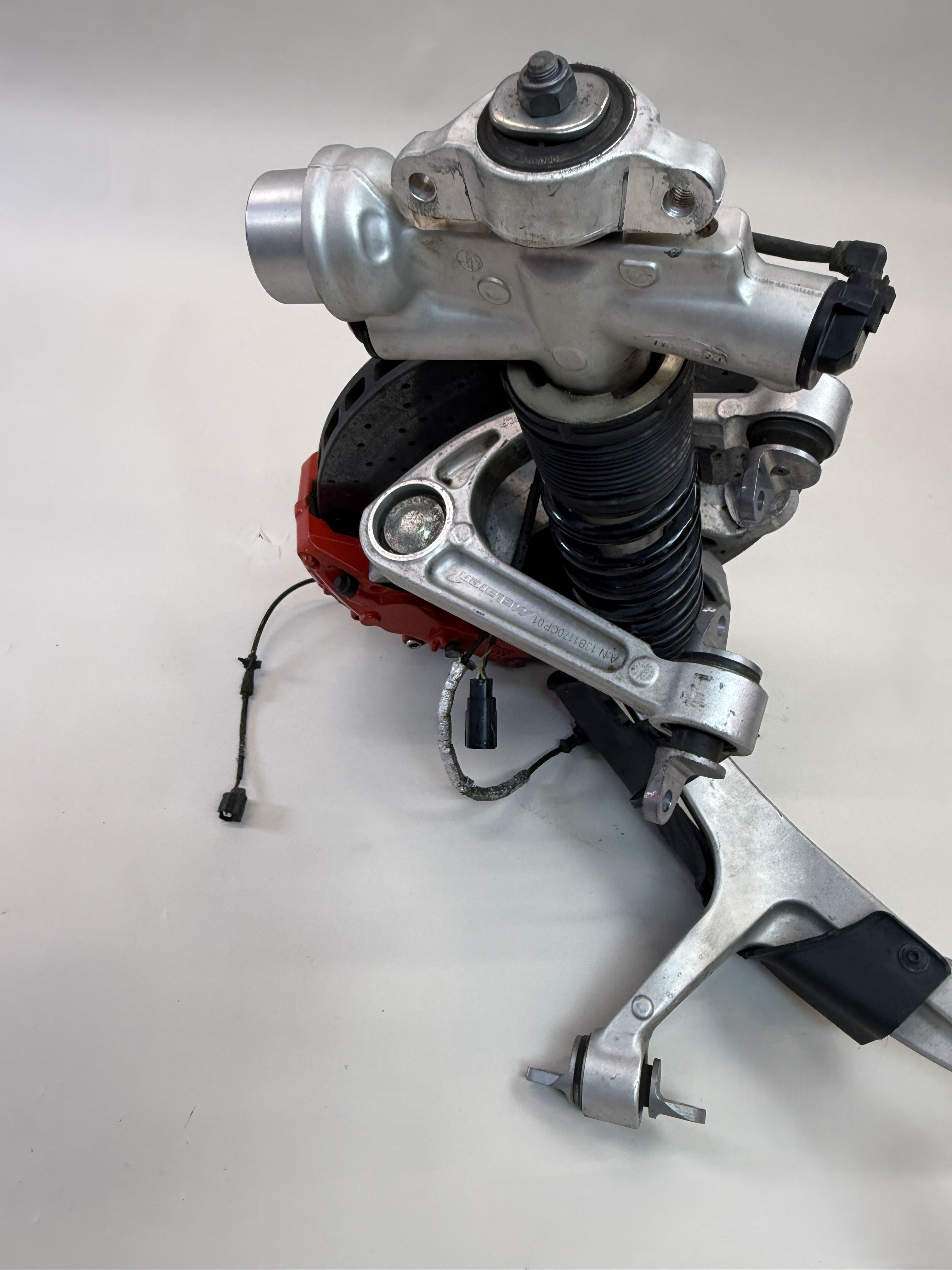 McLaren 570S Front Left Side Suspension & Brake Assembly OEM | Carbon Ceramic Rotor Red Caliper Shock