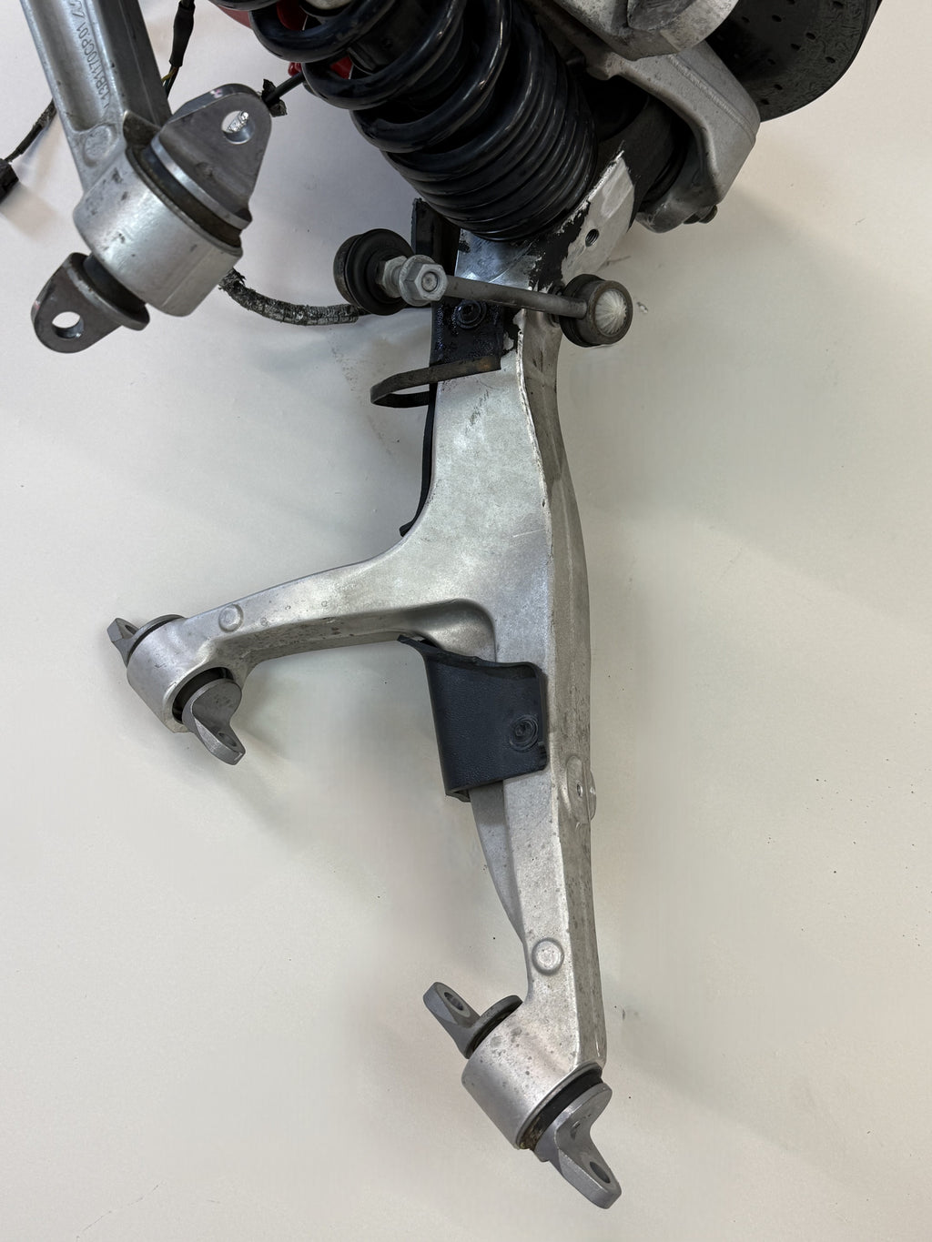 McLaren 570S Front Left Side Suspension & Brake Assembly OEM | Carbon Ceramic Rotor Red Caliper Shock