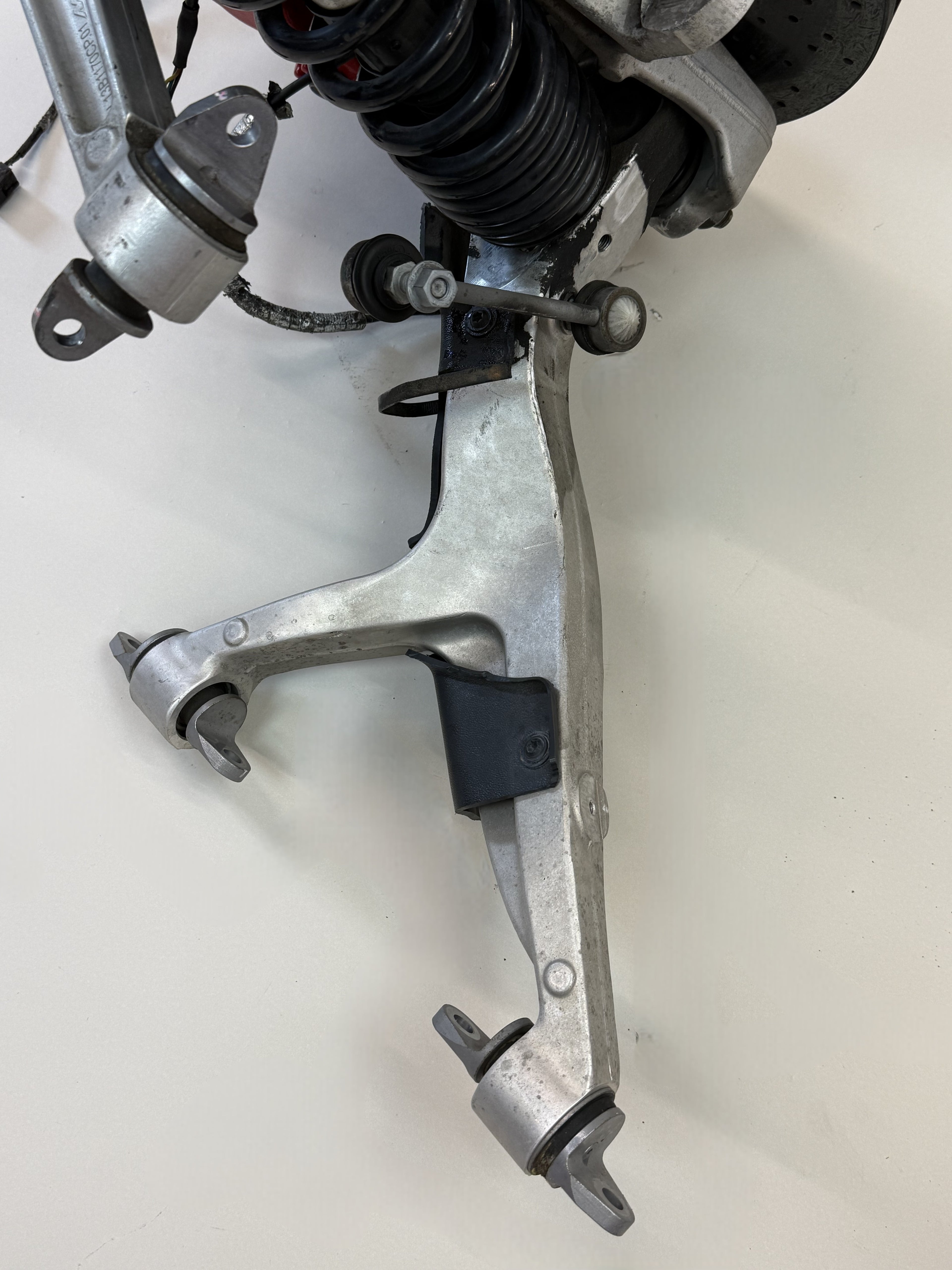 McLaren 570S Front Left Side Suspension & Brake Assembly OEM | Carbon Ceramic Rotor Red Caliper Shock